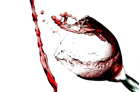 Fun spirts splash pour action red wine glass celebration party lifestyle happy Foto stock