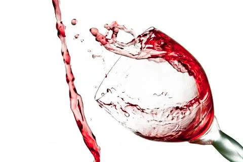 Fun spirts splash pour action red wine glass celebration party lifestyle happy Foto stock