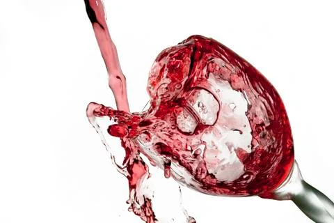 Fun spirts splash pour action red wine glass celebration party lifestyle happy Foto stock