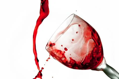 Fun spirts splash pour action red wine glass celebration party lifestyle happy Foto stock