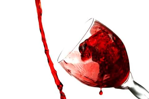 Fun spirts splash pour action red wine glass celebration party lifestyle happy Foto stock