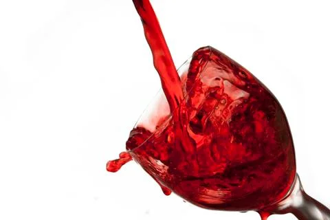 Fun spirts splash pour action red wine glass celebration party lifestyle happy Foto stock