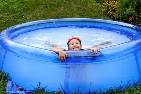 Fun in a swimming pool Stock Photos