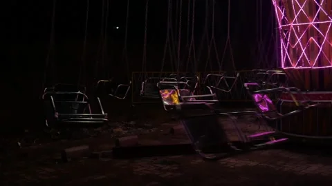 Fun swing, merry-go-round chain of empty chairs with no people riding. Video stock 291322077