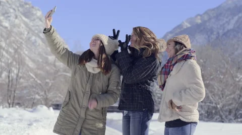 Fun Teens Take Silly Selfies Together On A Beautiful Winter Day In The Mountains Video stock 59743931