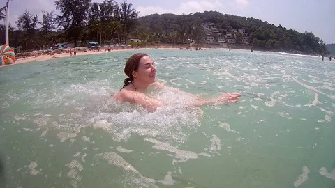 Fun in the warm Thai water Stock Footage 73687330