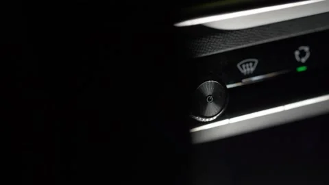 Function buttons such as audio switch and glass heating on the dashboard in the  Stock Footage 156803596
