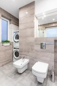 Functional bathroom in beige idea Stock Photos
