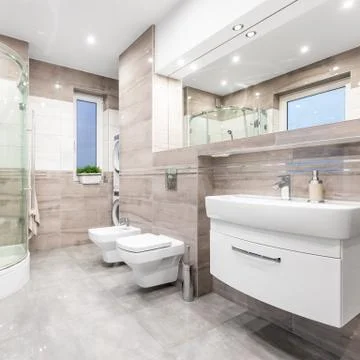 Functional bathroom in beige Stock-Fotos