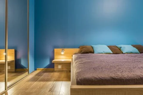 Functional bedroom in blue idea Stock Photos
