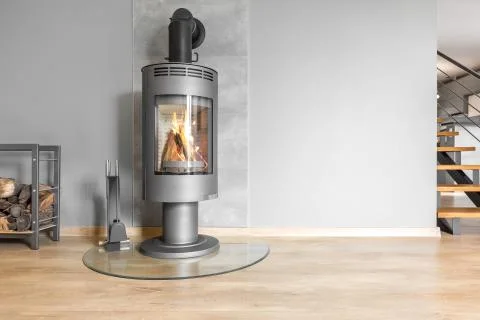 Functional fireplace with trendy look Stock Photos