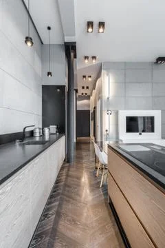 Functional kitchen with long worktop Stock Photos