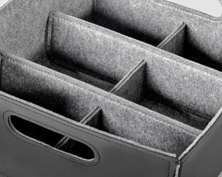 Functional leather storage box with felt lining, dividers and handles 库存照片