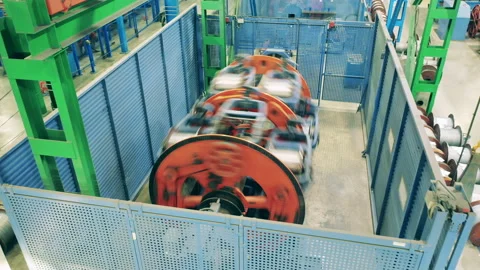 Functioning cable manufacturing machines at a cable plant Video stock 151836110
