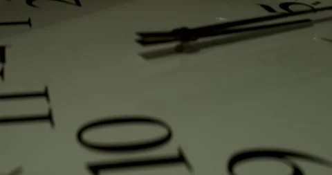 The functioning clock depicted in the video showcases a white timepiece 動画素材 242002226