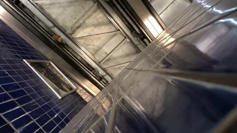 Functioning escalator next to a dismantled escalator Stock Footage 133656773