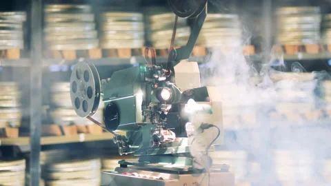 Functioning film projector in the clouds of smoke Video stock 147238252