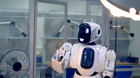 Functioning human-like android is lowering its hand Video stock 89655730