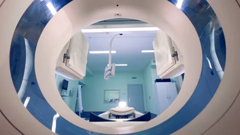 Functioning imaging scanner in it being shot through a target ring Video stock 90086915