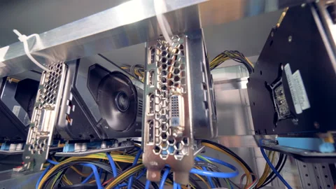 Functioning machines for bitcoin mining located in a mining rig Video stock 88648596