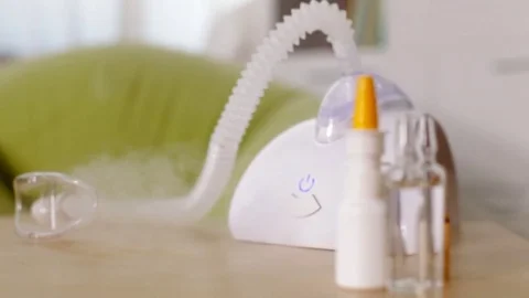 Functioning nebuliser inhaler device - camera dolly Stock Footage 80145164