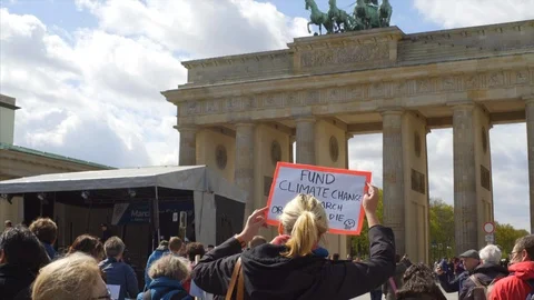 Fund climate research sign, protest March for Science Brandenburg Gate, Berlin Stock Footage 87450452