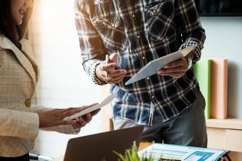 Fund managers team consultation and discuss about analysis Investment stock Stock Photos