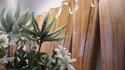 Funeral caskets with flowers Stock Footage 88171073