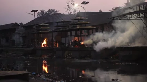 Funeral pyres at sunset Stock Footage 59117438