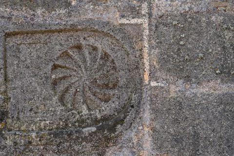 Funerary stele embedded in ancient wall, closeup Stock Photos