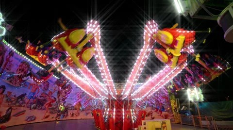 Funfair carousel jumping with dreamy look 11070 Stock Footage 28497223