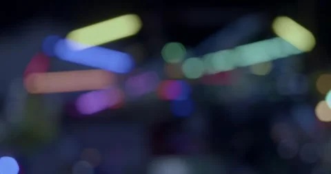 Funfair machine turning around with neon lights 스톡 동영상 242167535