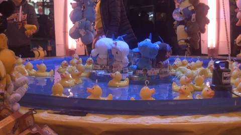 Funfair at Night Hook a Duck Slow Motion 動画素材 93789070