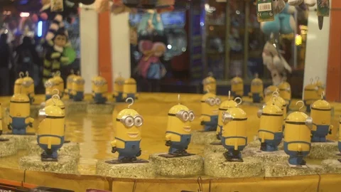 Funfair at Night Hook a Minion Slow Motion 動画素材 93789780