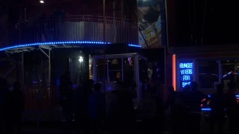 Funfair at Night - Slow Motion - Bungee Kiosk 動画素材 93787066