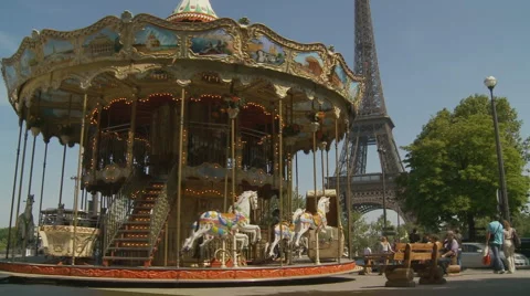 Funfair roundabout &amp; Eiffel Tower, Paris Stock Footage 5087524