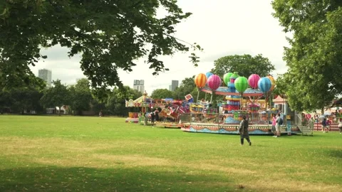 Funfair at West Ham Parks 150th Anniversary Stock Footage 280062716