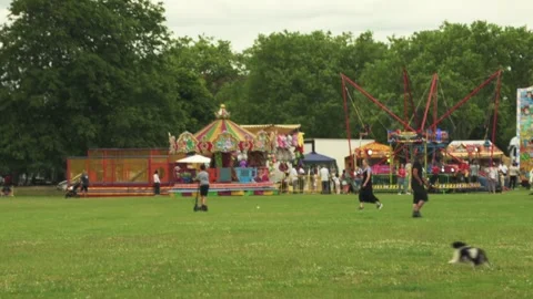 Funfair at West Ham Park’s 150th Anniversary Stock Footage 280062724