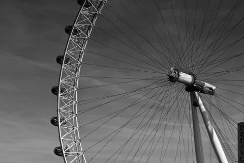 Funfair wheel looking up the sky with a partial closeup Stock Photos