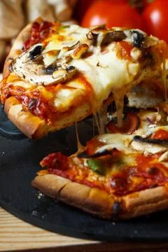 Funghi pizza slice Stock Photos