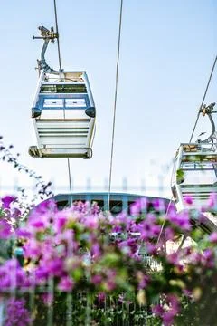 Funicular cabins on background of sky and nature Stock Photos