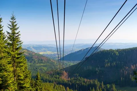 Funicular cable on the background of the beautiful valley of Zakopane, Poland Stock Photos
