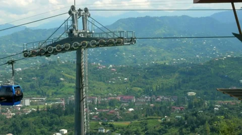 Funicular cable car in the summer in the mountains. Cabs passes a beautiful Stock Footage 67612662