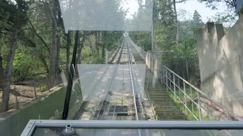 Funicular climbing up hill Stock Footage 252439223