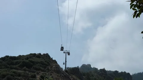 Funicular glides effortlessly from one side to other highlighting seamless Stock Footage 276896085