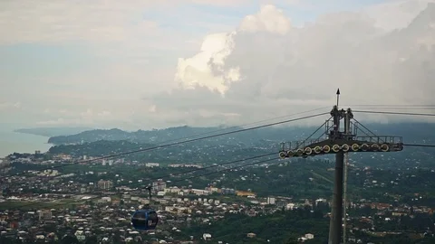 Funicular or cable car cabin moves in mountains and hills located on Black Sea Stock Footage 119274020