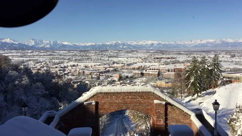 Funicular on snow old city image panoramic -under the arch in sun day Stock Footage 143133605