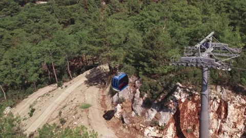 Funicular, teleferik, Cable car blue transparent cabins move along Stock Footage 162109005