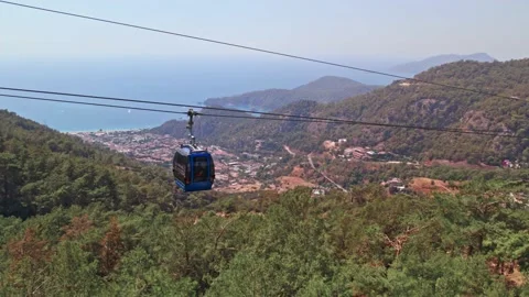 Funicular, teleferik, Cable car blue transparent cabins move along Stock Footage 162109030