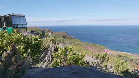 Funicular train transporting passengers down a hillside Stock Footage 242013678